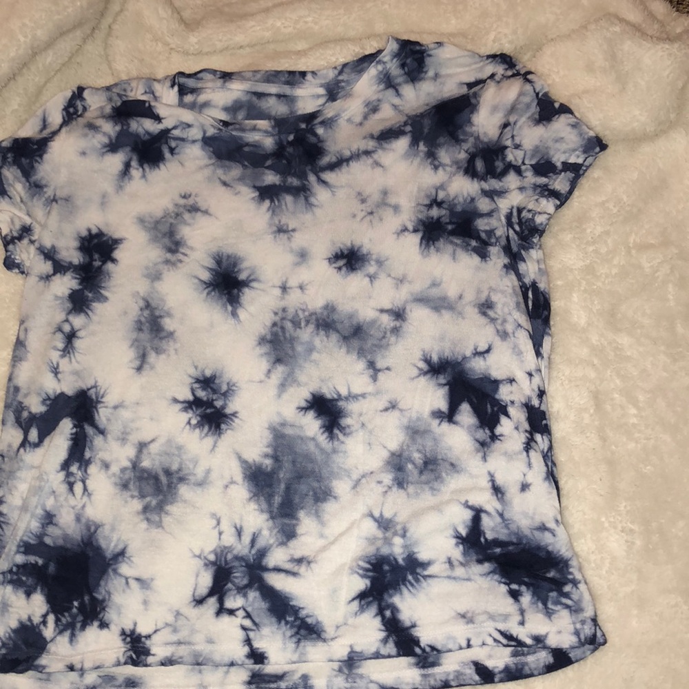 A blue tie dye cropped t shirt